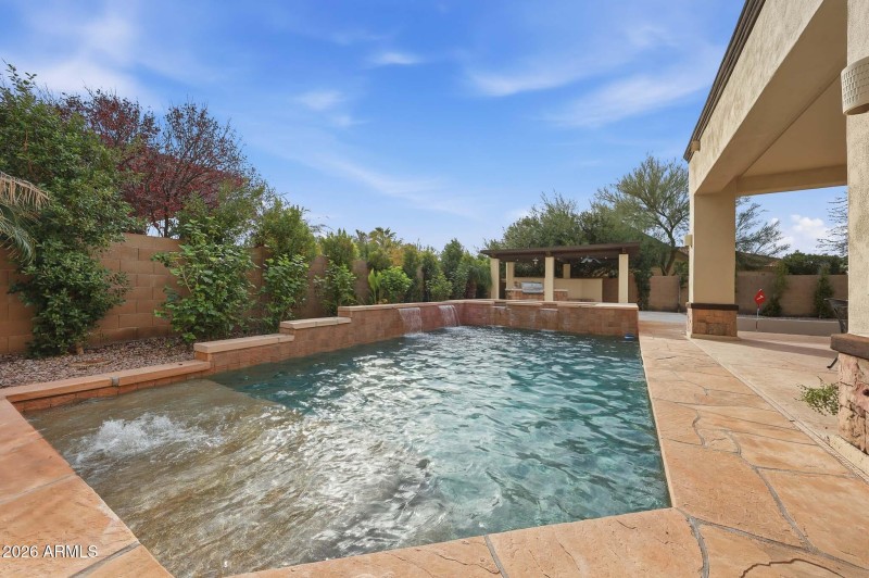 heated pool with baja shelf