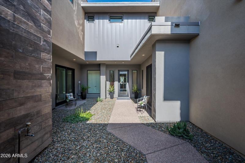 Entry through courtyard