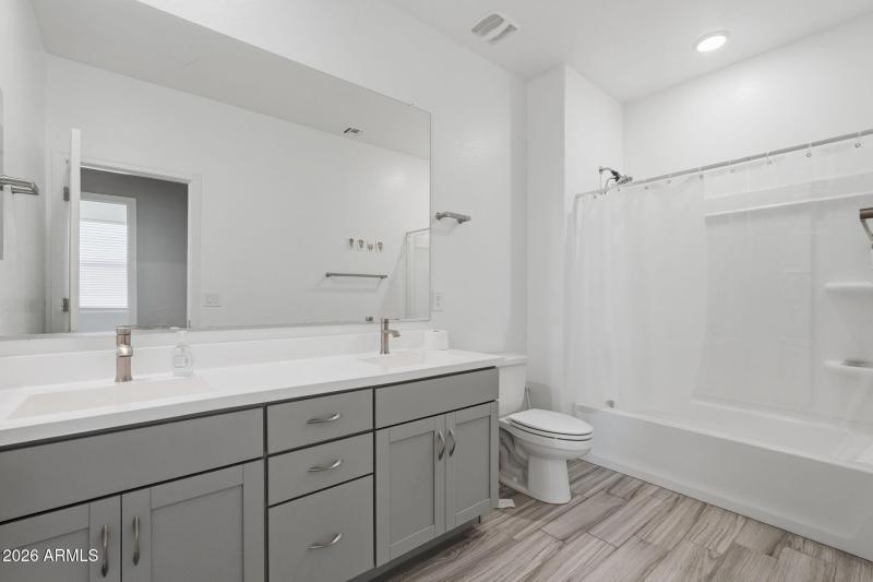 Full bathroom w/ dual sinks
