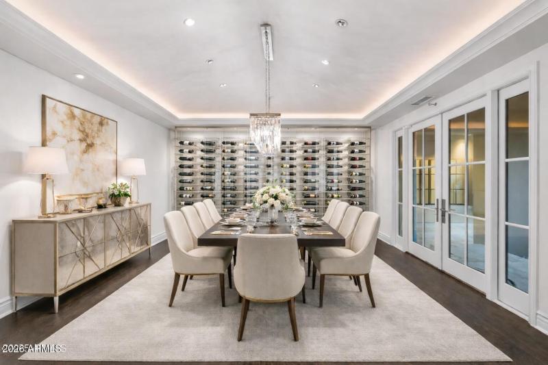 Elegant dining room with wine wall