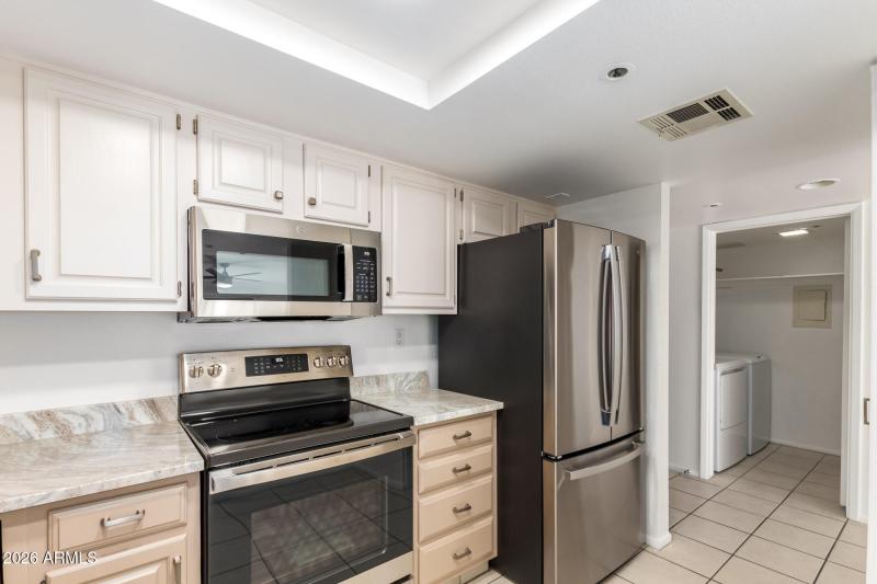 NEW FRENCH DOOR REFRIGERATOR