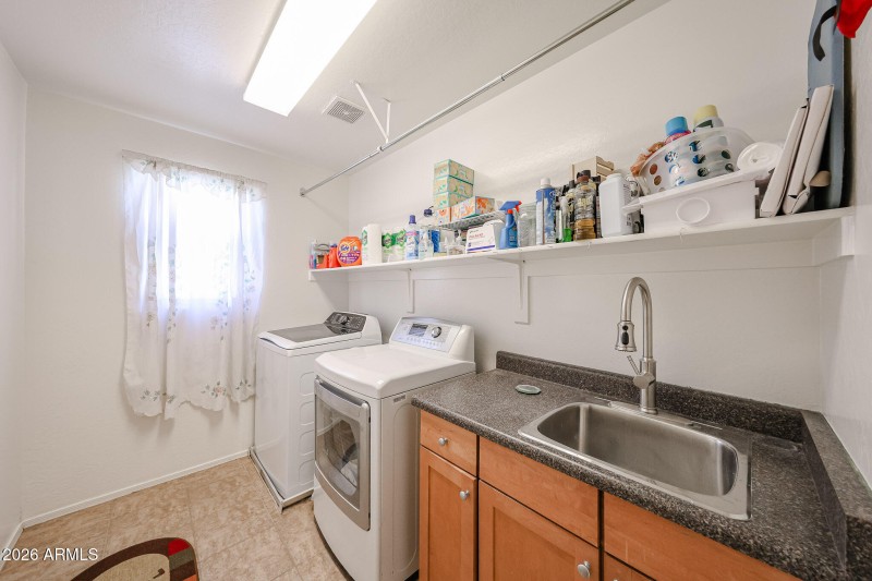 Upstairs Laundry Room with Built in Sink