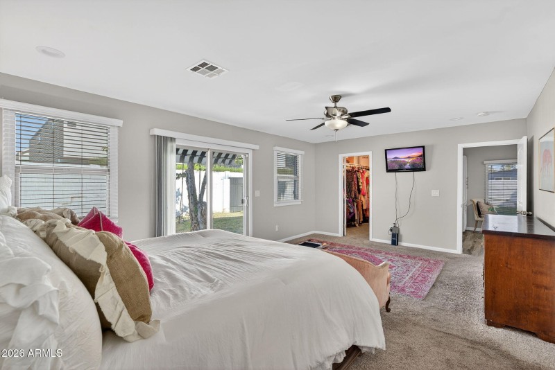 Primary bedroom with walk in closet