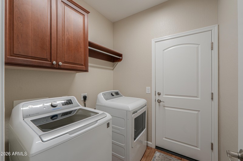 Laundry w/ cabinets