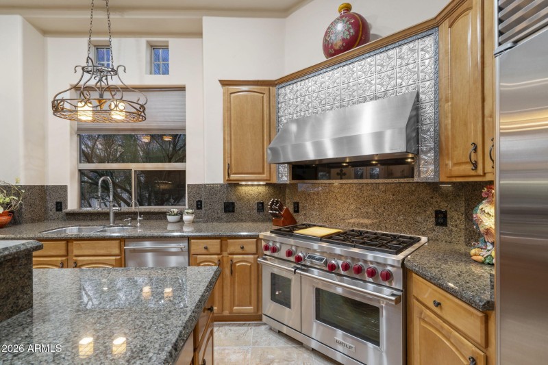 Kitchen w Wolf Range & Stainless Hood