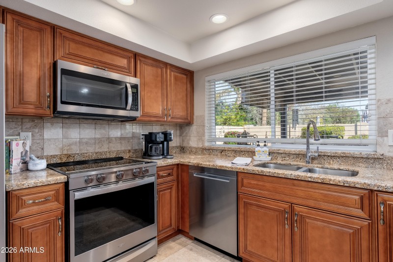 Bright Kitchen With Granite