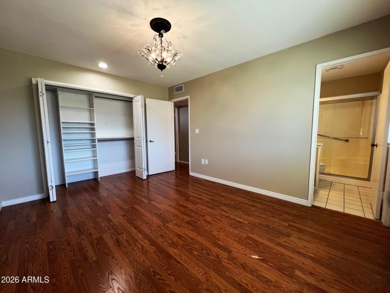 Primary Bedroom Into Bathroom
