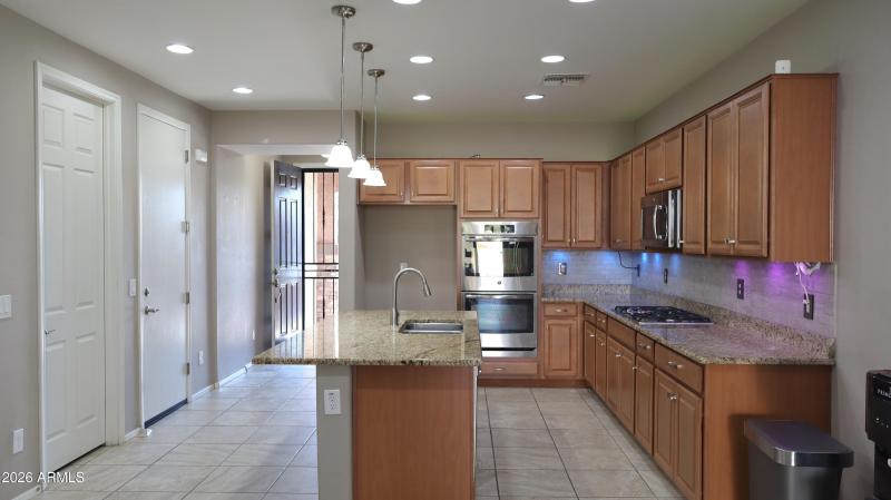 Open Kitchen with Granite Island