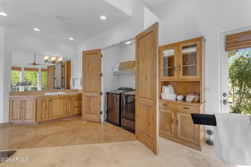 Primary bathroom with 2nd laundry