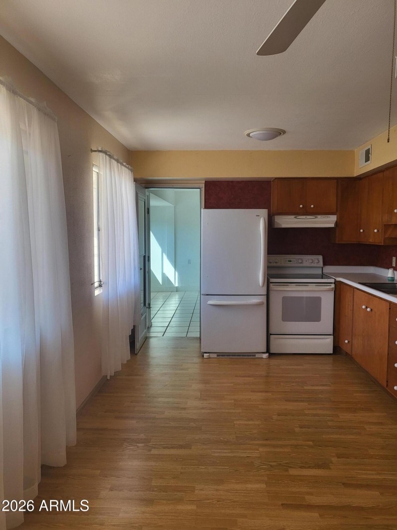 EXIT TO ENCLOSED BALCONY