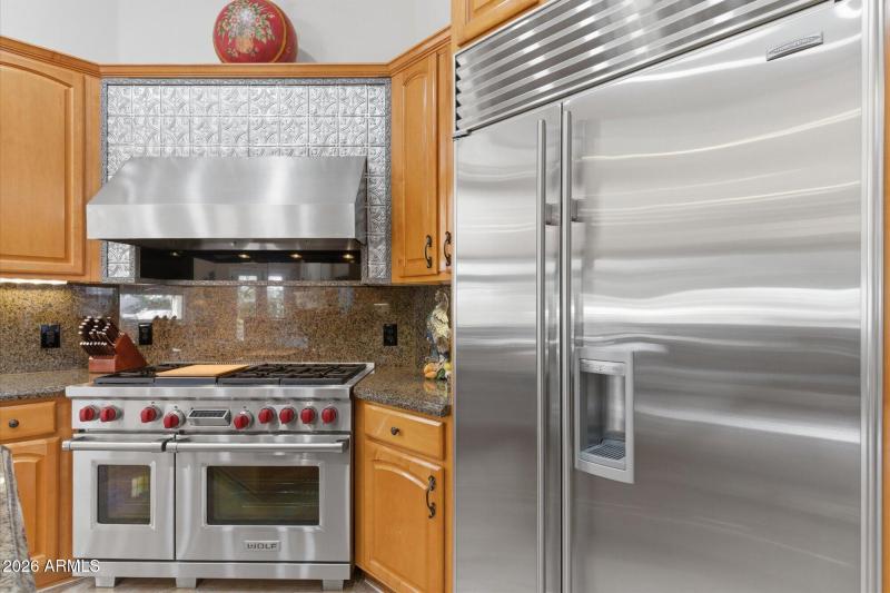 Kitchen w Wolf Range & Stainless Hood