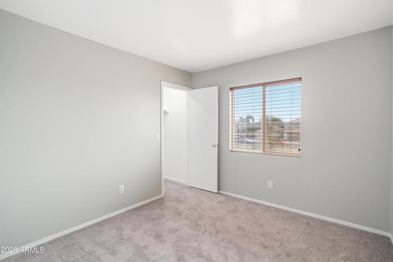 Walk in closet in 3rd bedroom