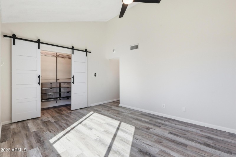 Primary Bdrm w/ built in closet shelves