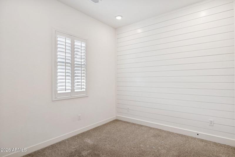 Bedroom 2 with accent wall