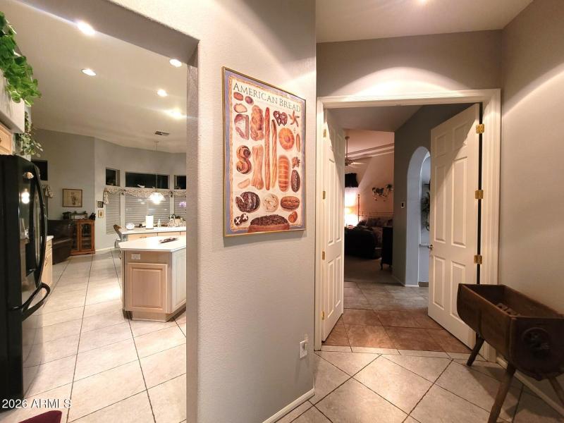 Hall to Kitchen and primary suite