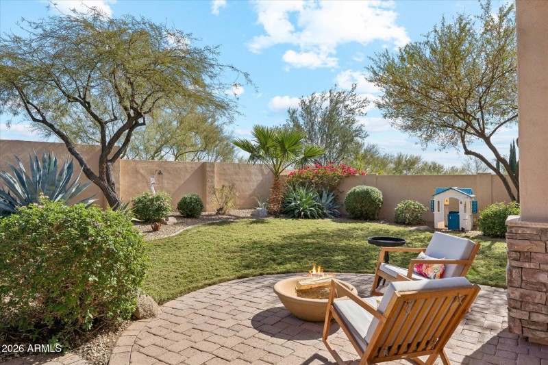 Multiple Sitting Spaces In Backyard