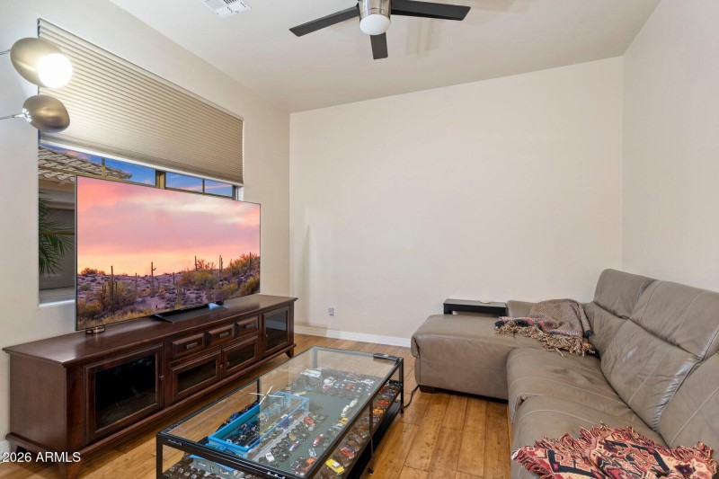 Bedroom w Wood Flooring