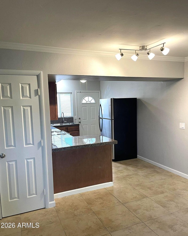 Kitchen opens to the living room.