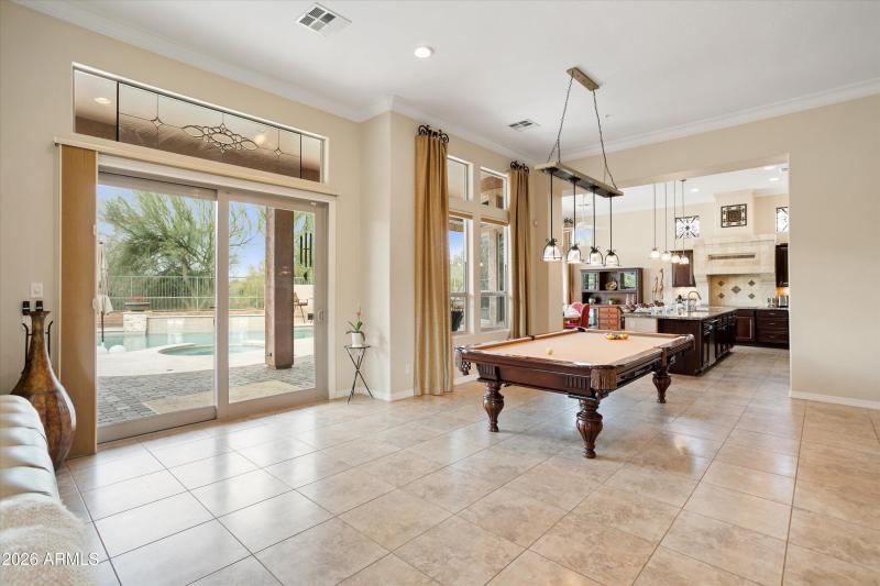 THE POOL TABLE OCCUPIES