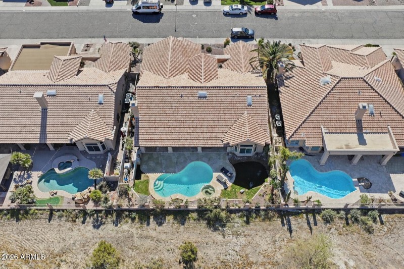 Suburban homes with backyard pools