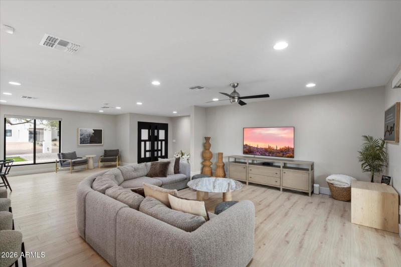 Open Living Room w Wood Flooring