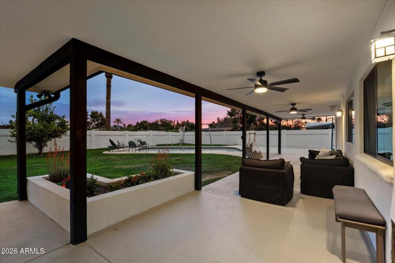 Covered Patio w Backyard And Pool View
