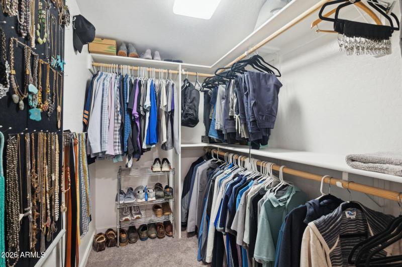 Walk-in closet in primary suite