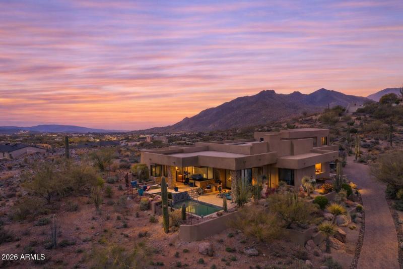 Desert hilltop estate twilight