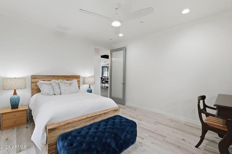 Guest Room w/ French Doors to Courtyard