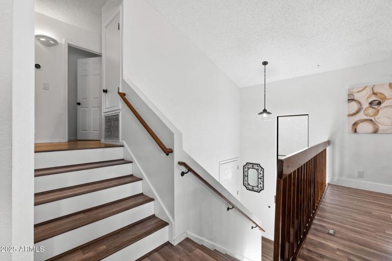 Stairs up to 2 bedrooms