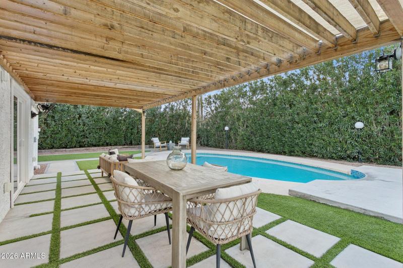Poolside patio and synthetic turf