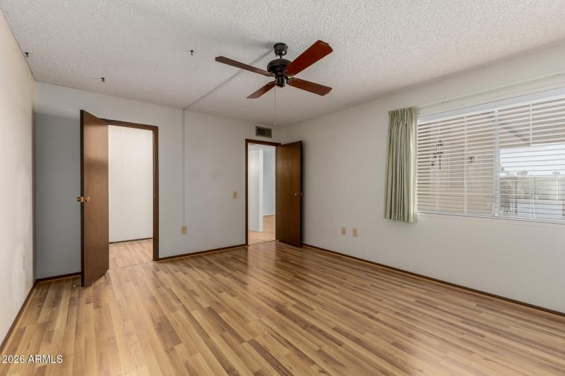 Walk in closet in secondary bedroom
