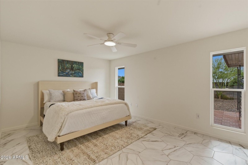 New windows overlooking walled backyard