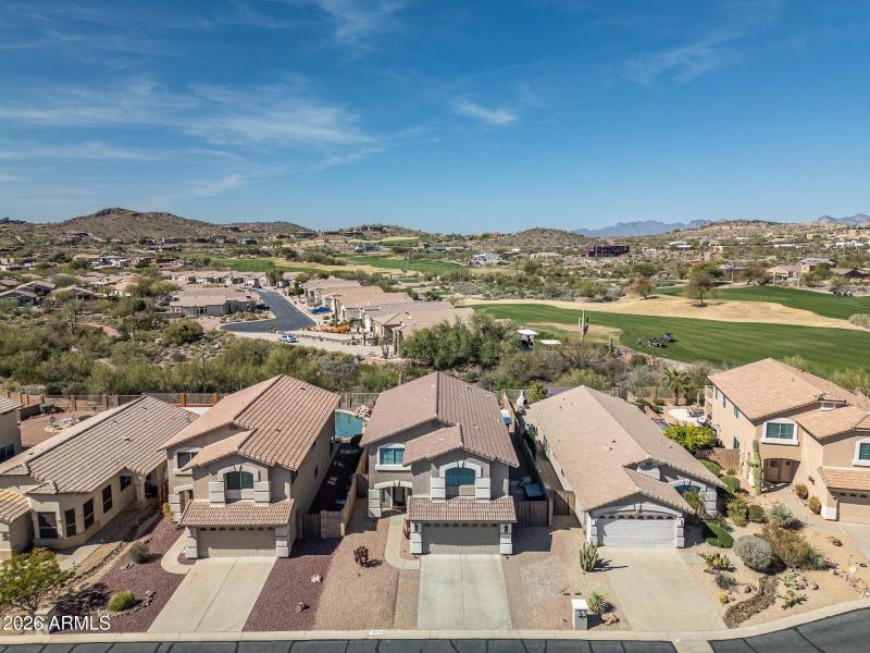 Drone View of golf course behind