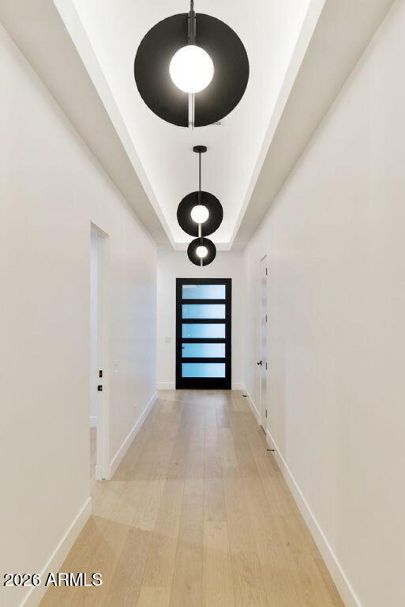 Foyer With Designer Lights & Cove Lighti