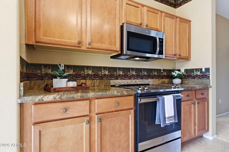 Ample Cabinetry + Granite Counters