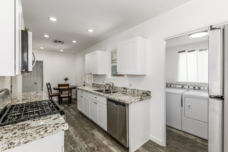 KITCHEN INTO THE LAUDRY