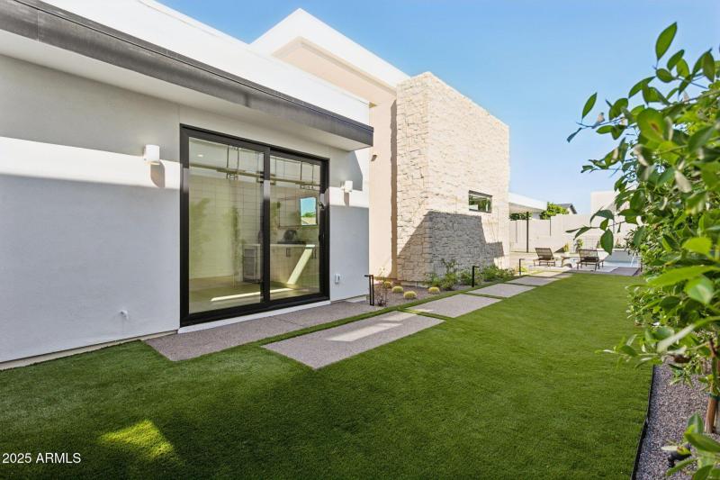 Side yard with grass area