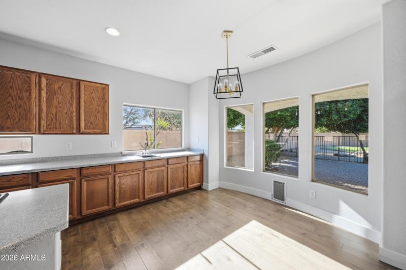 Spacious kitchen with backyard views