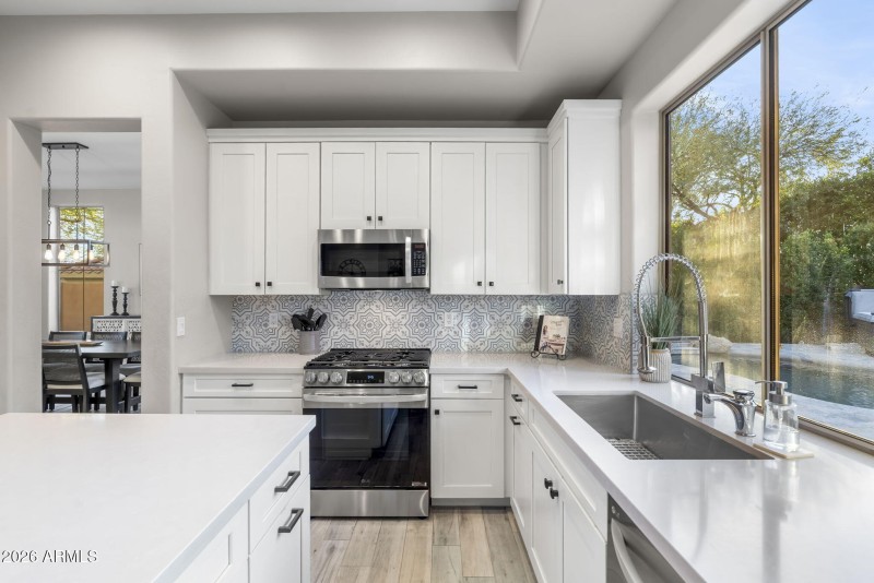 Quartz counters & Tile Backsplash