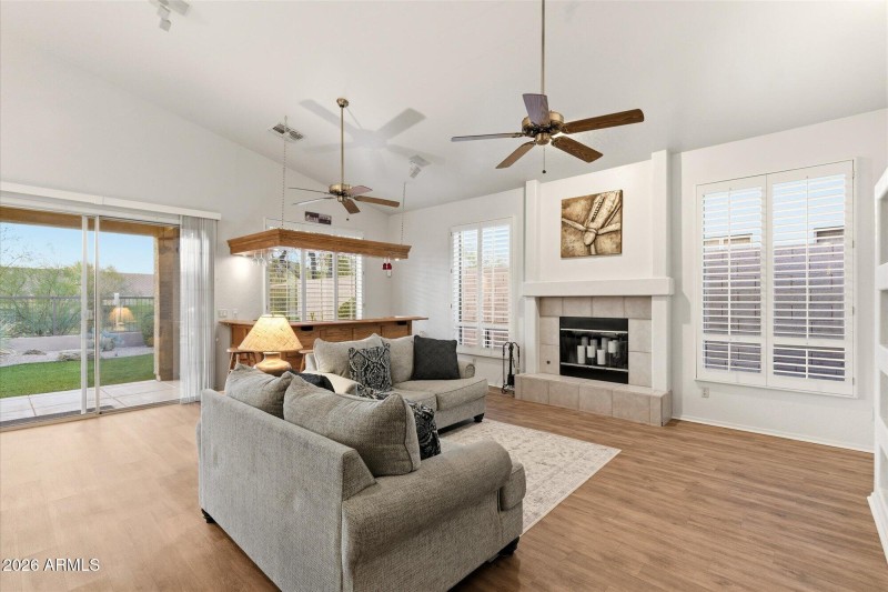 FR w Fireplace & Backyard Views