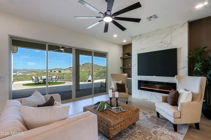 Great room with fireplace and slider