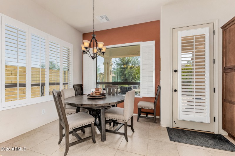 Dining area with backyard views