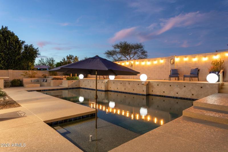 Pool with Sunbathing Area