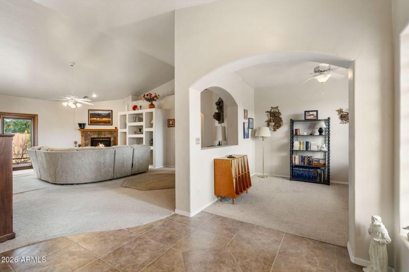 FOYER VIEW TO LIVING ROOM & OFFICE/DEN