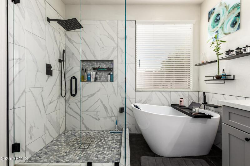 large walk in shower and oversized tub