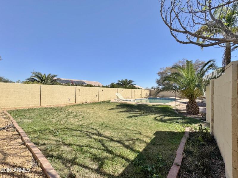 Large separate fenced yard for pool