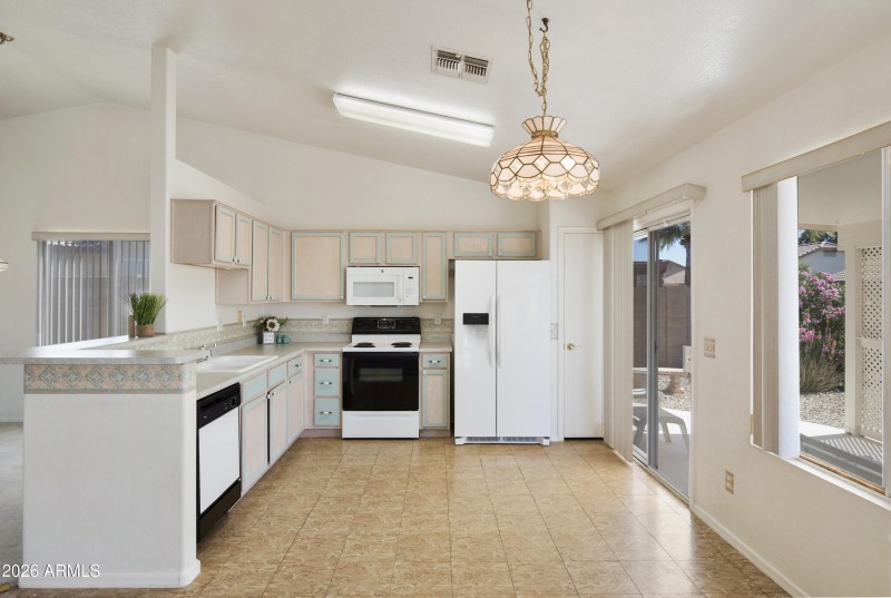 Breakfast nook with backyard views