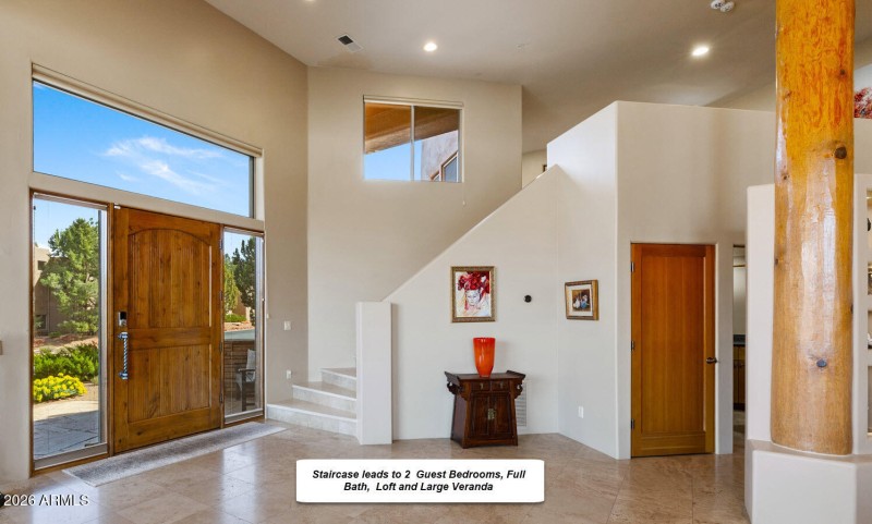 Travertine staircase leads too...