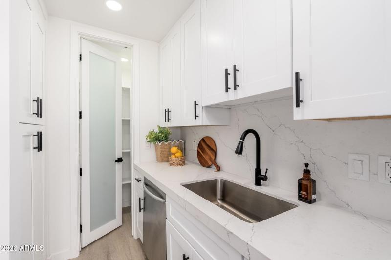 Kitchen View Toward Walk-In Pantry
